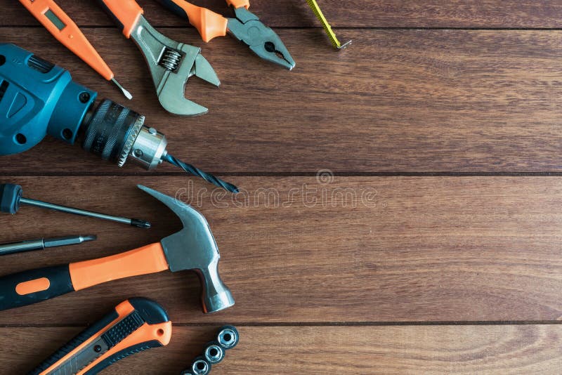 Set of work tools on wooden background. With copy space, Top view stock photography
