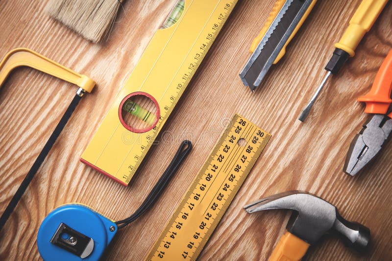 Work tools on wooden background stock photos