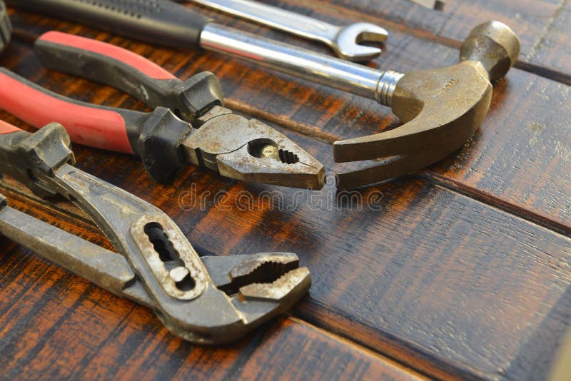Work tools. On wooden background stock images