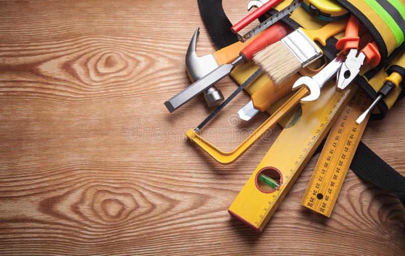 Work tools on wooden background royalty free stock image