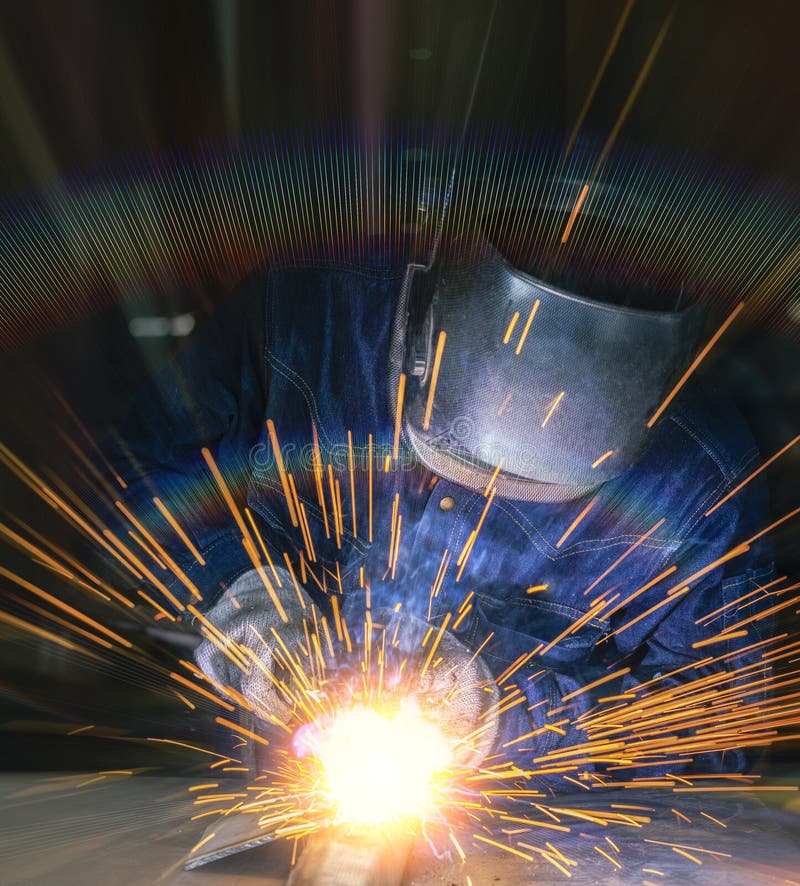 Worker welding. The steel part by manual stock photo